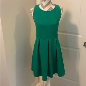Green ( more Kelly green) cocktail dress.
